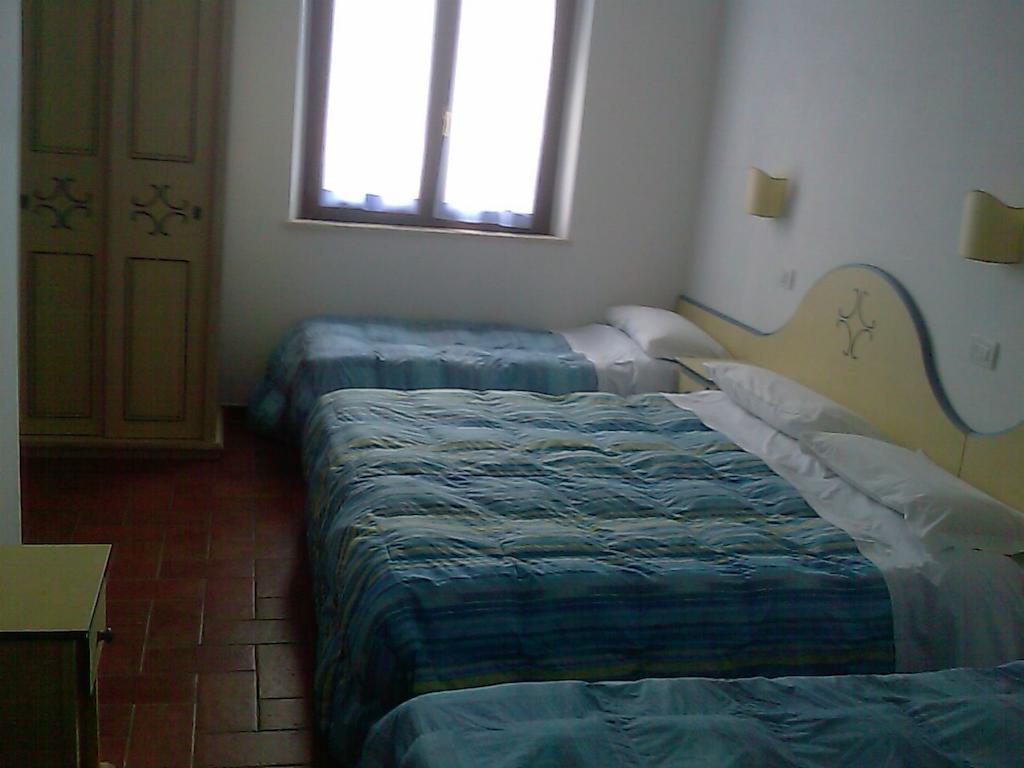Ostello Victor Center Asís Habitación foto