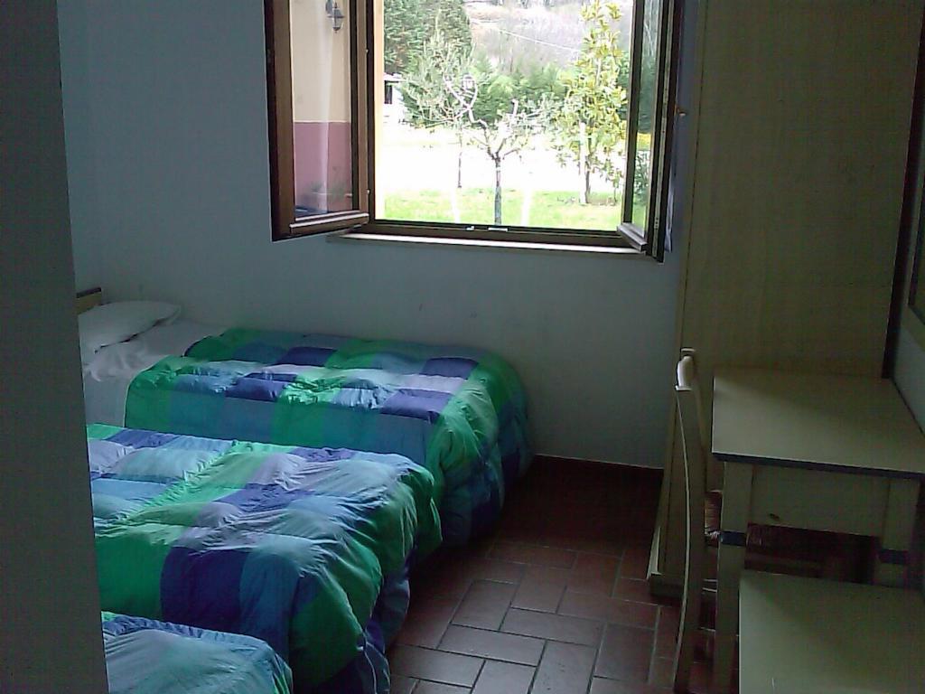 Ostello Victor Center Asís Habitación foto