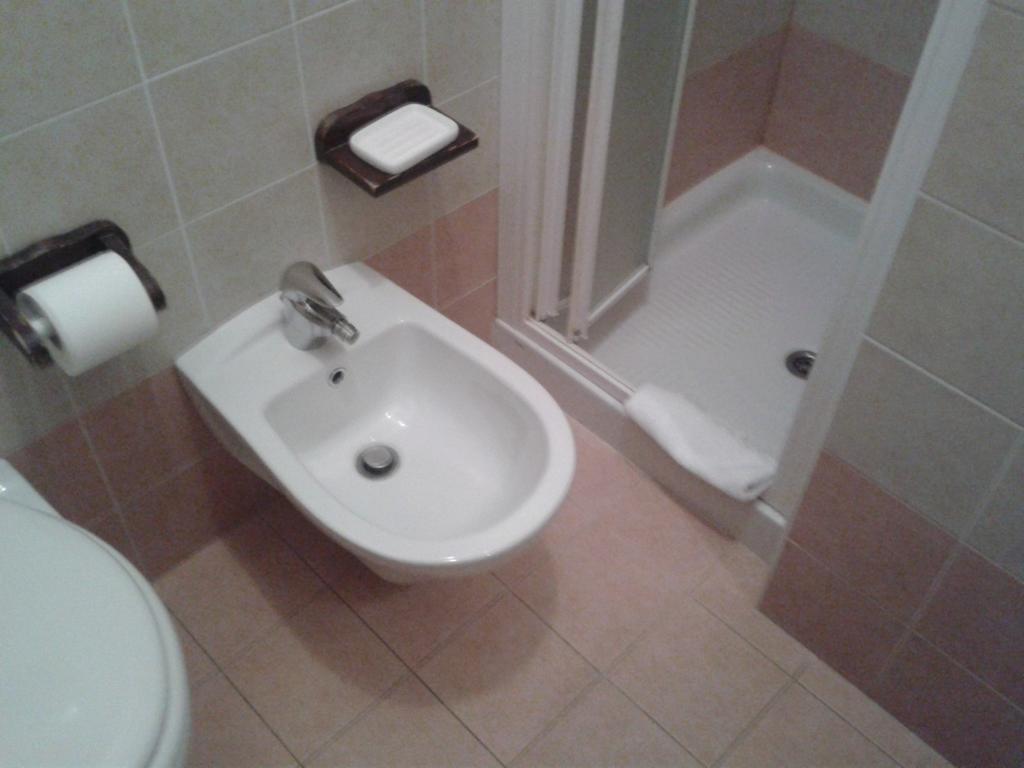 Ostello Victor Center Asís Habitación foto